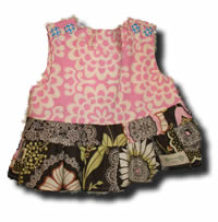 Click to See More Ruffle Tops with Buttons